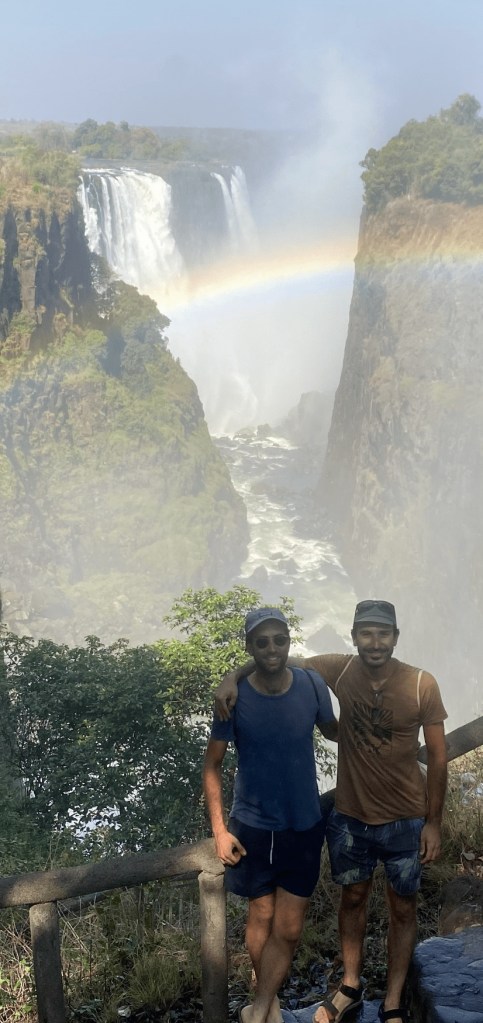 Two cyclist arriving to the Victoria falls on the Zimbabwe side