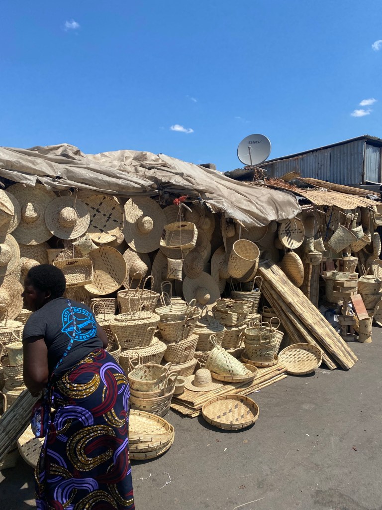 Zambian selling crafted art next to luangwa bridge