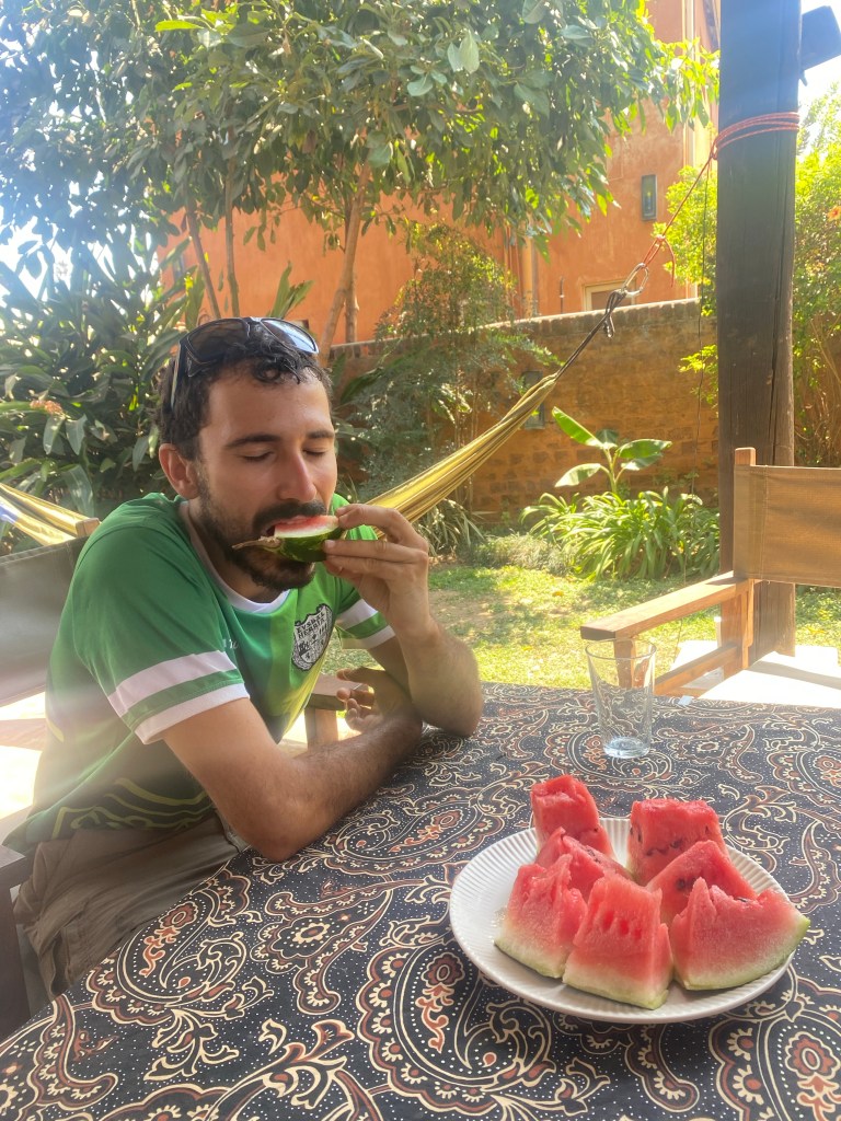 Javi enjoying watermelon as we arrive to Aya and Simon’s house