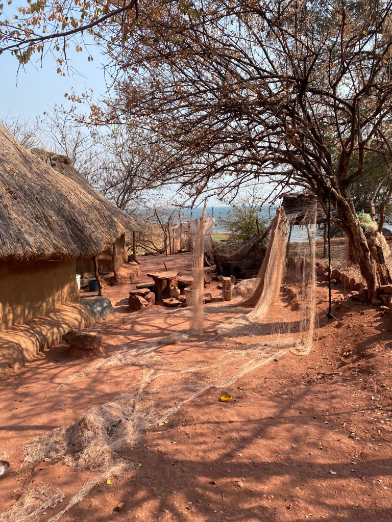 Fisherman village in matusadona preparing their fishing nets