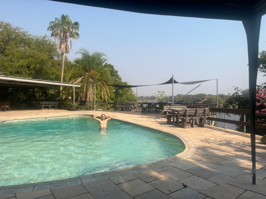 Chilling at the swimming pool of gwabi lodge