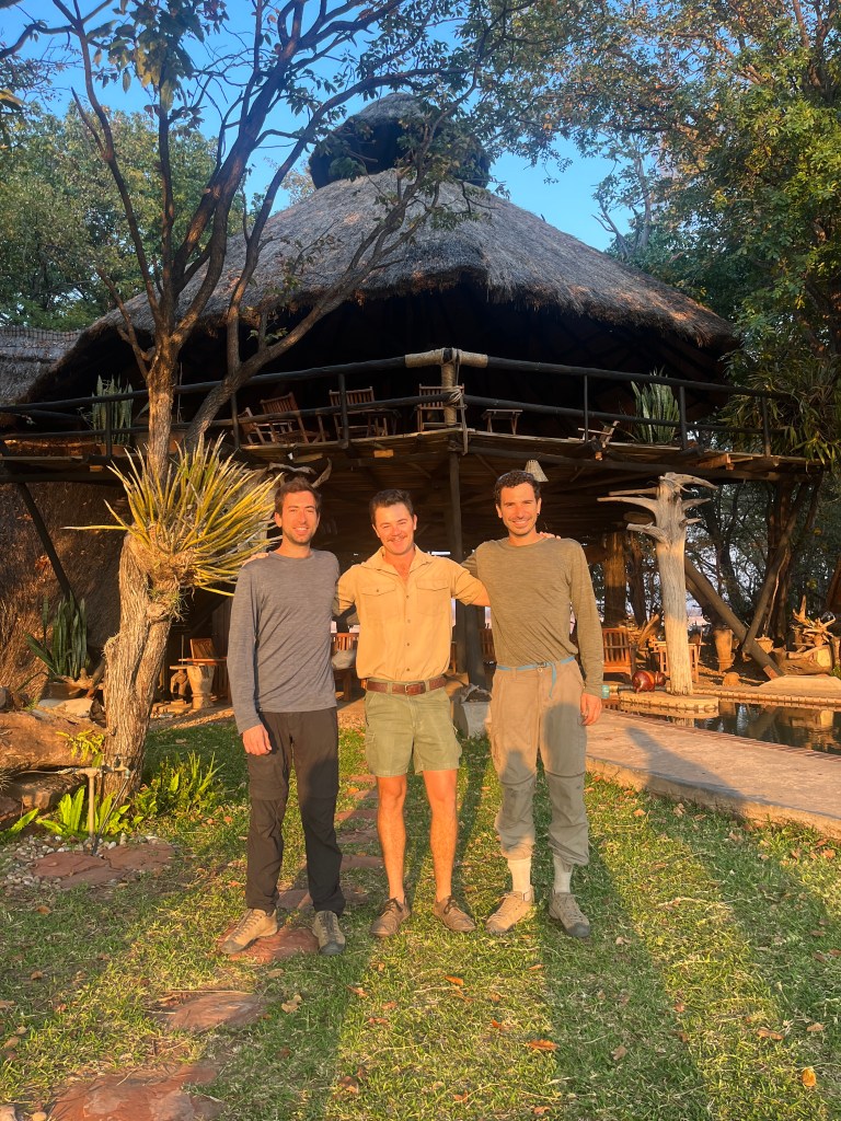 Graham and us in front of the hut of Musango