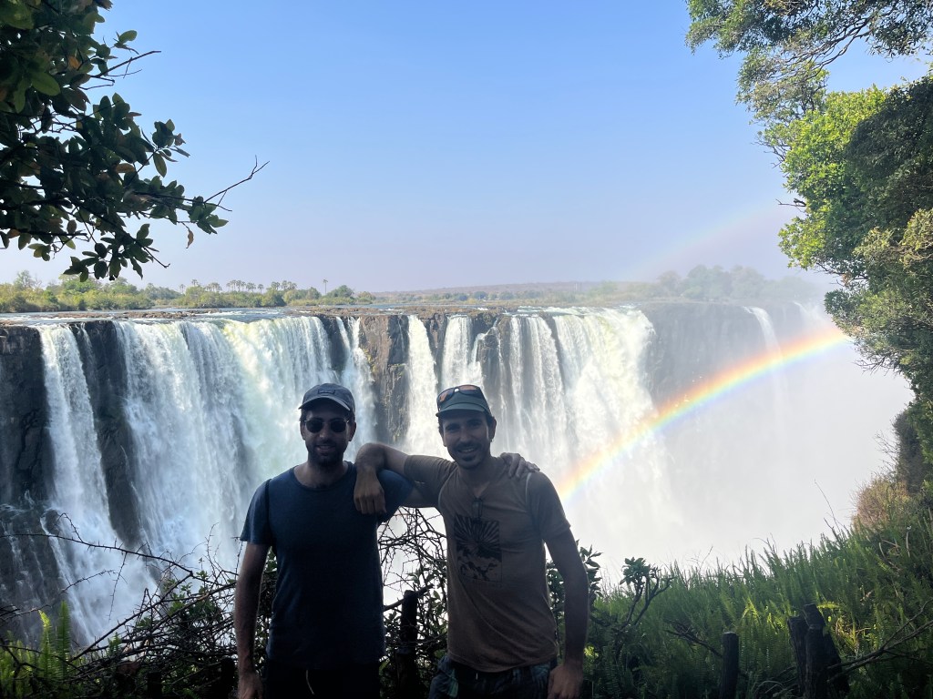 Two cyclist arriving to Victoria falls on the Zimbabwe side