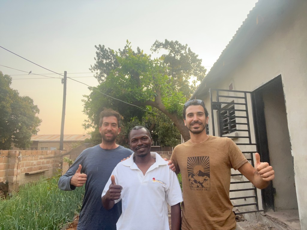 Two cyclist and their couchsurfer in Livingstone Zambia 