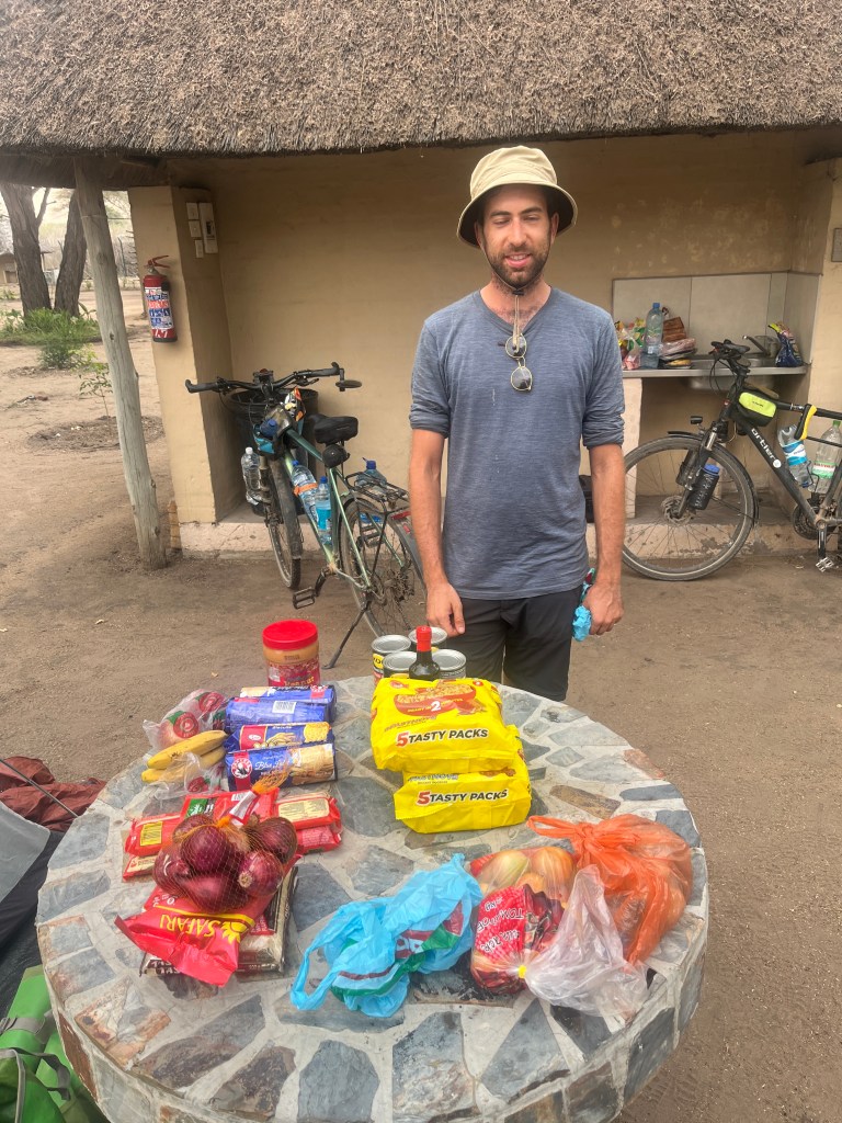 Cyclist with food supply for four days in Botswana 