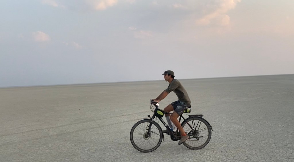 A cyclist going through Nata bird sanctuary 