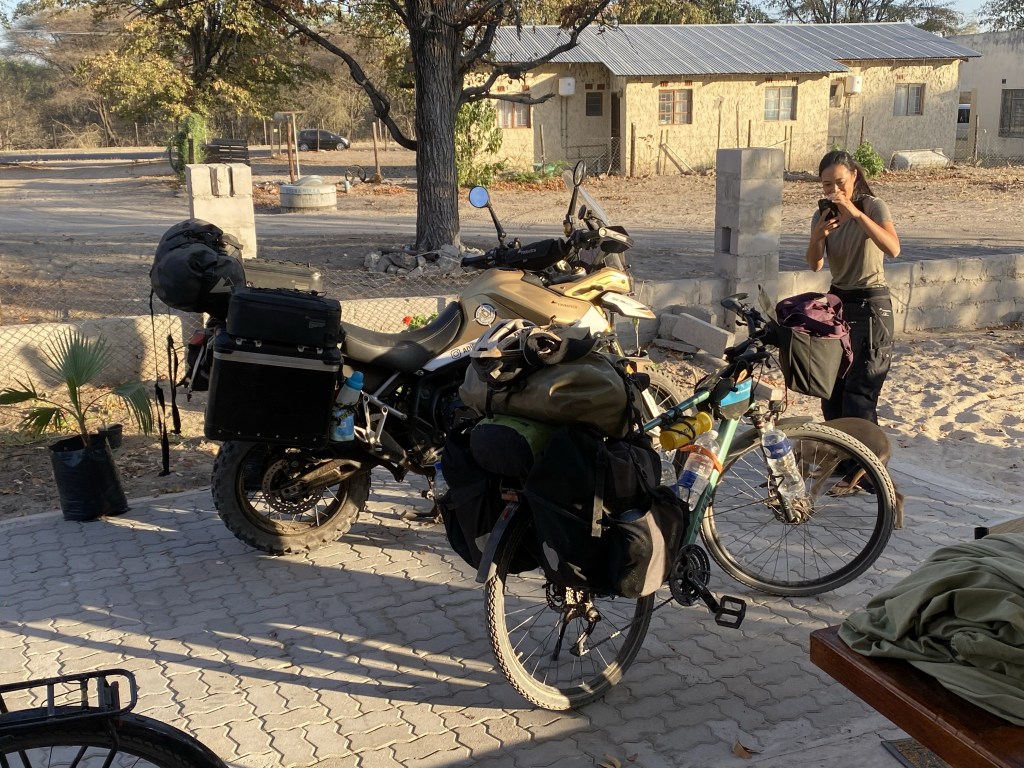 A bicycle and a mottorcycle in Maun Botswana 