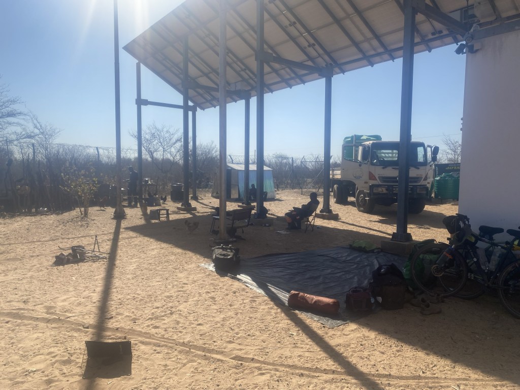 Cyclist camping in an antenna in Botswana next to ghanzi 