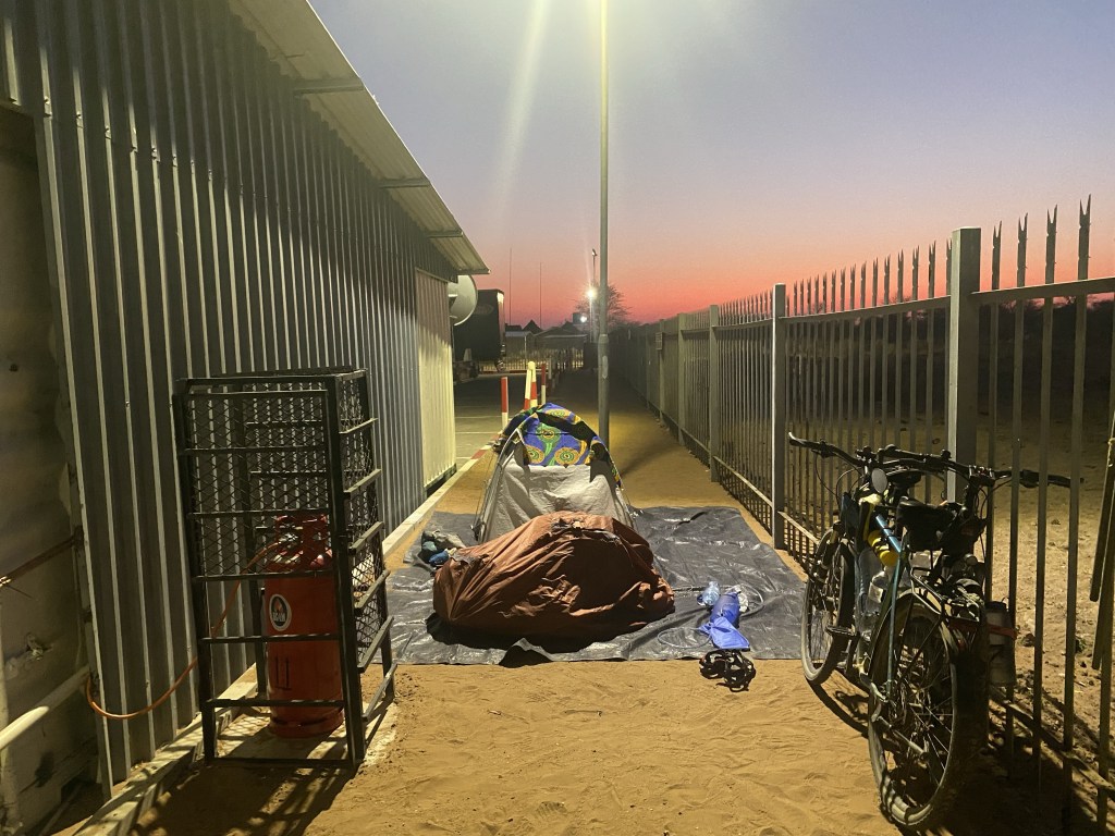 A pitch tent from two cyclist touring Africa in Botswana 