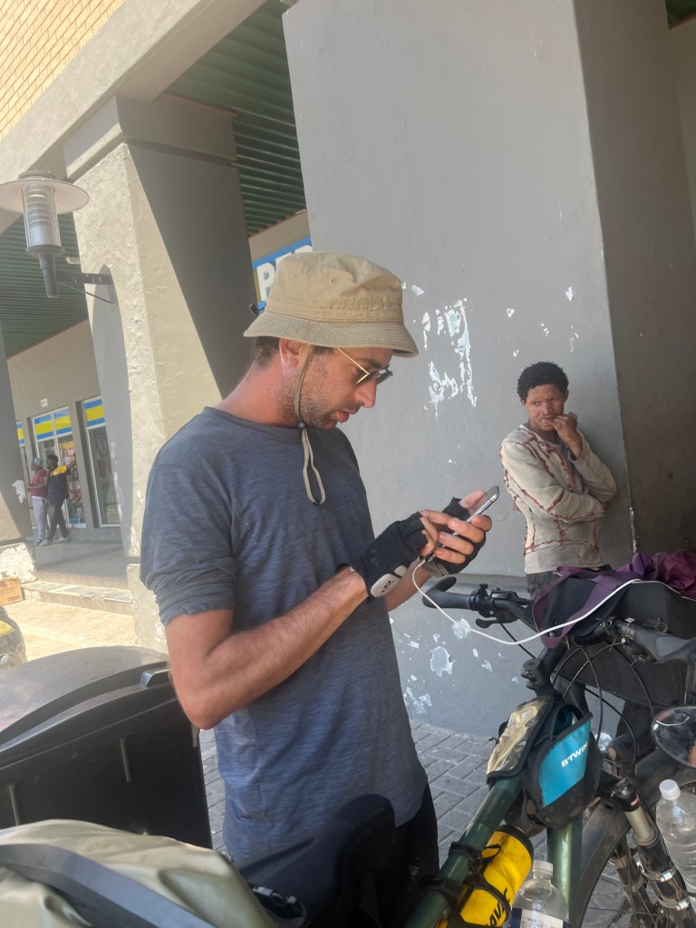Gaspard checking the wind forecast in Ghanzi 