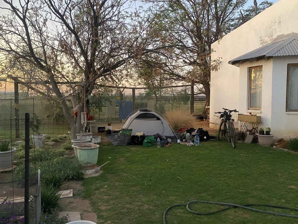 The tent of two cyclist in a garden in seeis namibia 